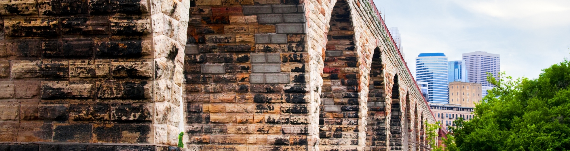The landmark Stone Arch Bridge crossing the Mississippi River in downtown Mineapolis